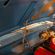 Illustration for article titled Why The Datsun 510s Hood Prop Rod Was Perfect
